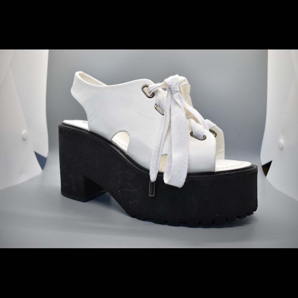 White opened toed platform shoes